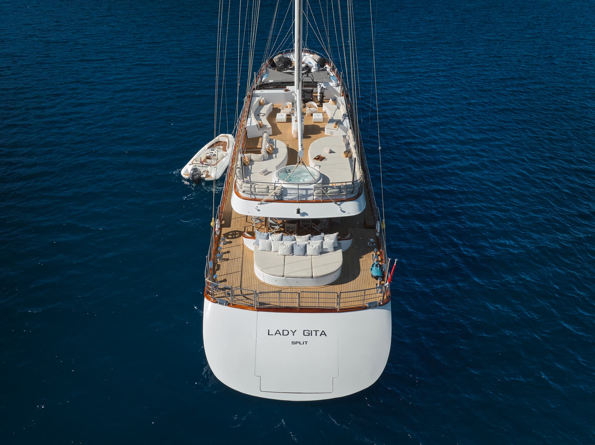 Yacht Lady Gita from Split anchored on deep blue sea water, aerial view