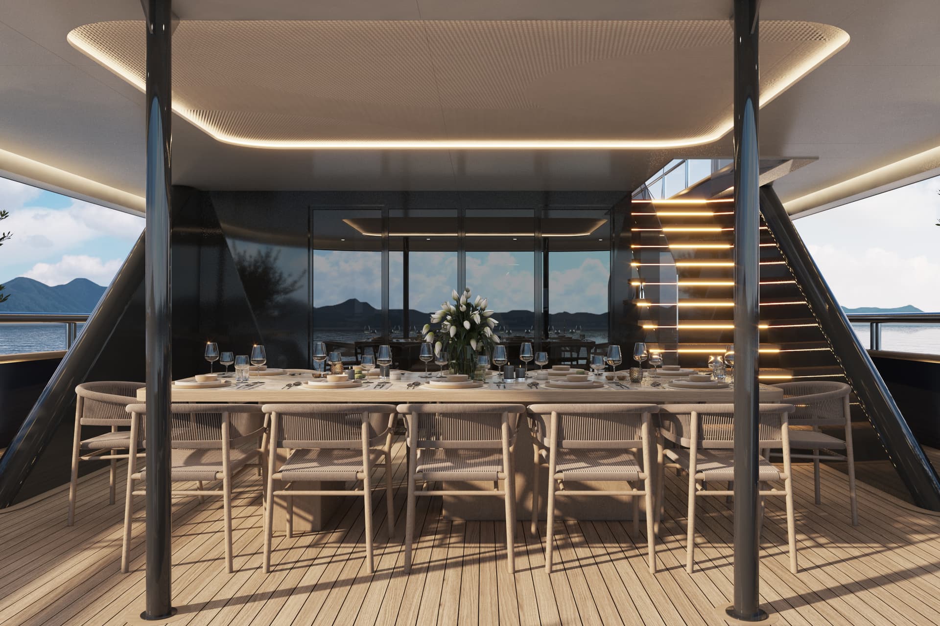Luxury yacht dining area with set table on wooden deck and sea view