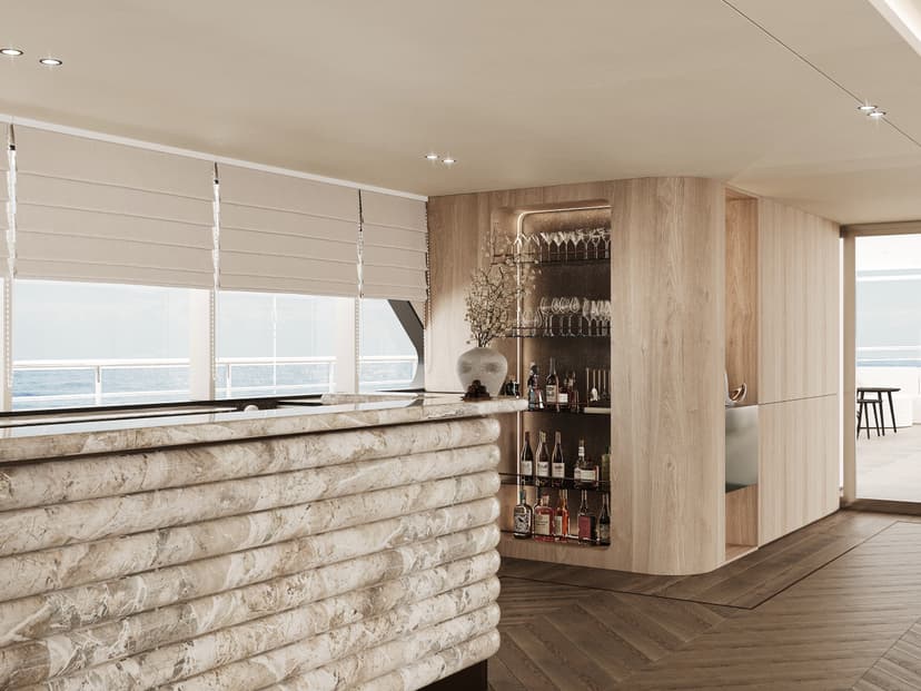 Modern yacht interior lounge with marble bar and built-in liquor shelving