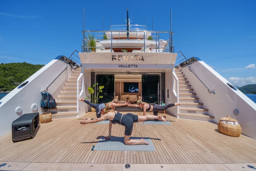 Women doing yoga on the deck of yacht Renata in Valletta